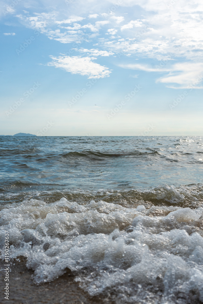 Fototapeta premium Water wave surf to beach in the sea at Bangsan beach in Chonburi at Thailand