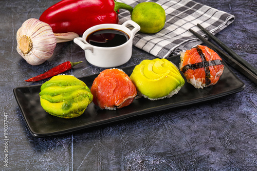 Round tamari sushi with salmon and avocado photo