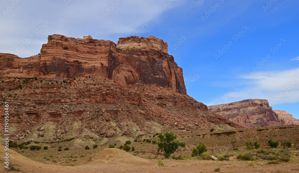 dramatic red rock formations on a sunny summer day in the san rafael river canyon along the buckhorn draw scenic byway in the northern san rafael swell near green river, utah dramatic red rock formations on a sunny summer day in the san rafael river canyon along the buckhorn draw scenic byway in the northern san rafael swell near green river, utah