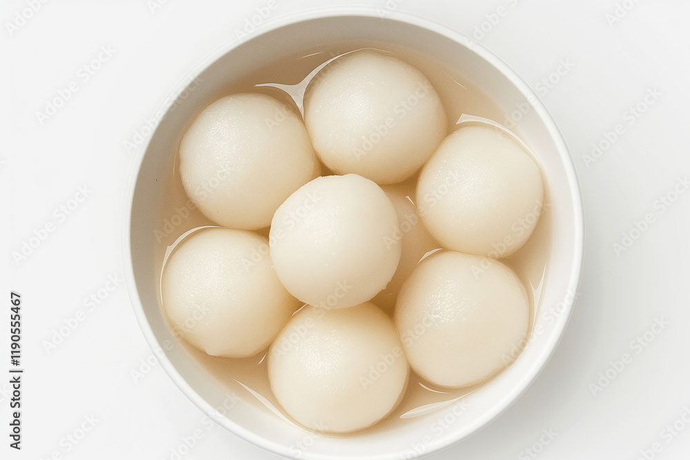 Traditional Chinese Tangyuan Dessert in a White Round Bowl Traditional Chinese Tangyuan Dessert in a White Round Bowl