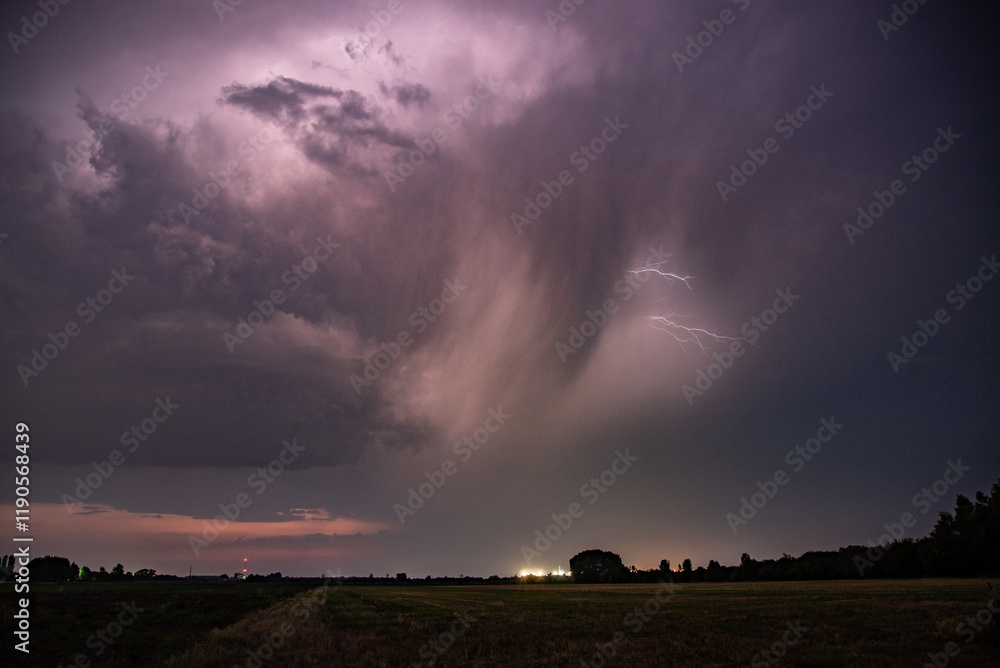 Obraz premium Image from a powerful lightning strike in the fields 
