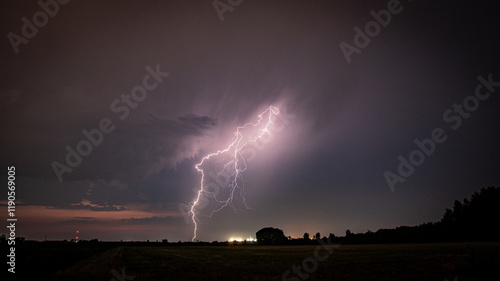 Image from a powerful lightning strike in the fields  photo