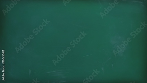 Green chalkboard background with chalk texture, suitable for school education concepts, dark wall backdrop, or design templates. photo