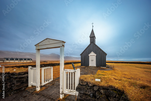Obraz na płótnie The traditional wooden church of Budakirkja in the autumn landscape in the west of Iceland w salonie