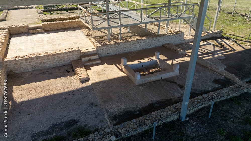 Ancient Archaeological Site with Stone Ruins and Canopy from the Roman Villa of Brunel in Quesada, Jaen, Spain Ancient Archaeological Site with Stone Ruins and Canopy from the Roman Villa of Brunel in Quesada, Jaen, Spain