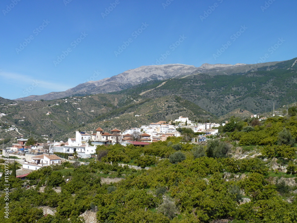 Hiking in the hills above Nerja in the Axarquia region of Andalucia, Spain. A view of La Maroma and Canillas de Albaida Hiking in the hills above Nerja in the Axarquia region of Andalucia, Spain. A view of La Maroma and Canillas de Albaida