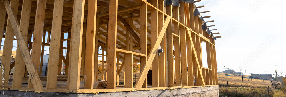 Construction works, building a house with wood Construction works, building a house with wood