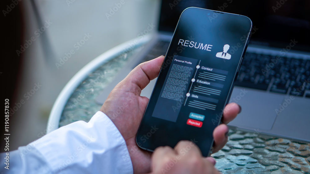 A businessman using a smartphone with digital resume icons and a checkmark, symbolizing recruitment, digital hiring processes, and professional evaluation.