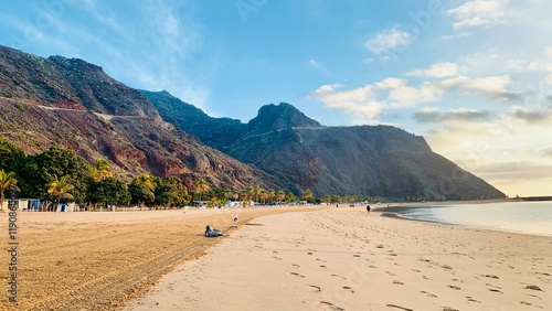 Playa de Las Teresitas, Tenerife, Sunny Coastal Beach with Scenic Hills and Vegetation Near Clear Blue Ocean Waves