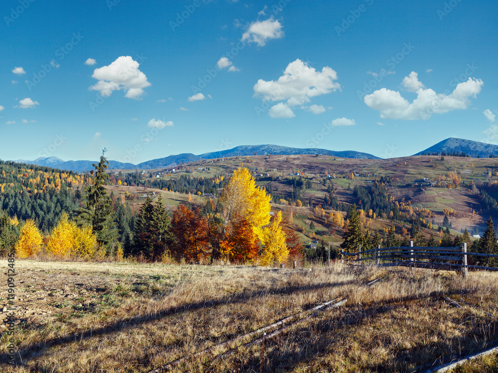 Morning Carpathian mountains and village hamlets on slopes (Yablunytsia village and pass, Ivano-Frankivsk oblast, Ukraine).