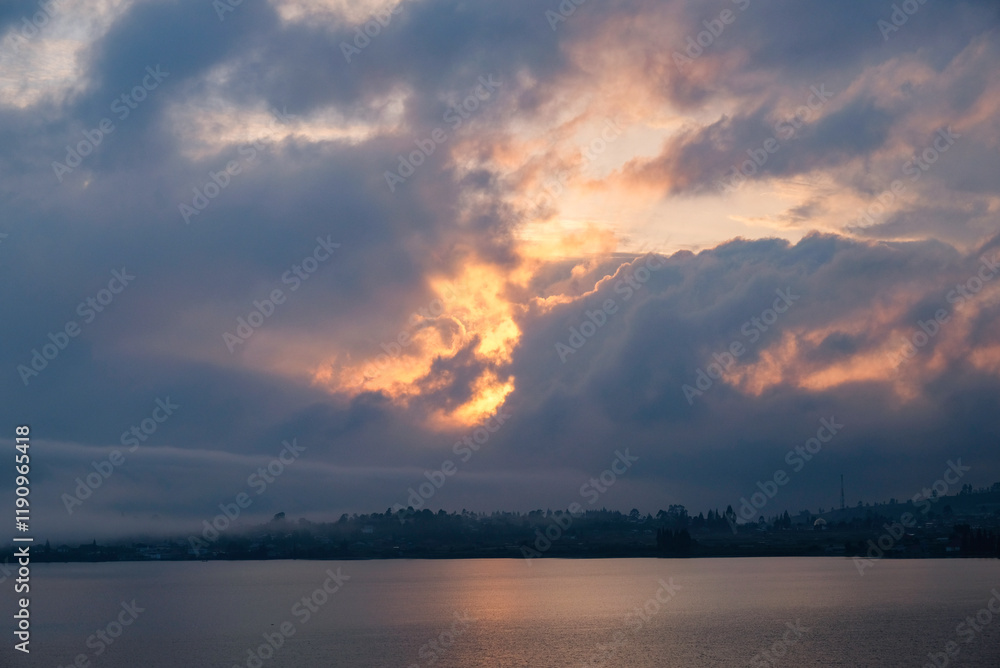 Beautiful view of Diatas Lake in the morning with sunrise sky. Beautiful view of Diatas Lake in the morning with sunrise sky.