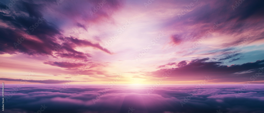 Obraz premium breathtaking sunrise above sea of clouds with vibrant pink, purple, and orange hues creating serene and dreamy atmosphere.