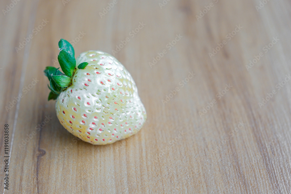 Fresh Organic Ripe Strawberries In A Porcelain Bowl over wooden background