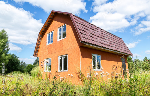 Wallpaper Mural New small unfinished wooden house at the countryside in summer Torontodigital.ca