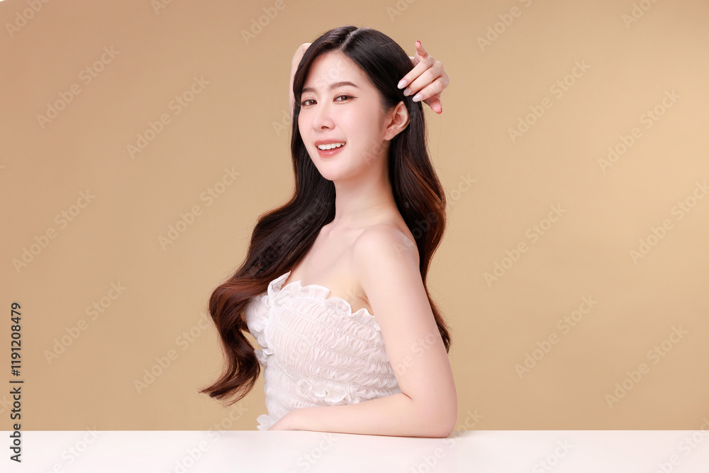 Beauty portraits of young Asian woman with clean fresh skin on beige background. Cute female model, beauty blogger make up artist in studio. Skincare, plastic surgery, spa concept. Beauty portraits of young Asian woman with clean fresh skin on beige background. Cute female model, beauty blogger make up artist in studio. Skincare, plastic surgery, spa concept.