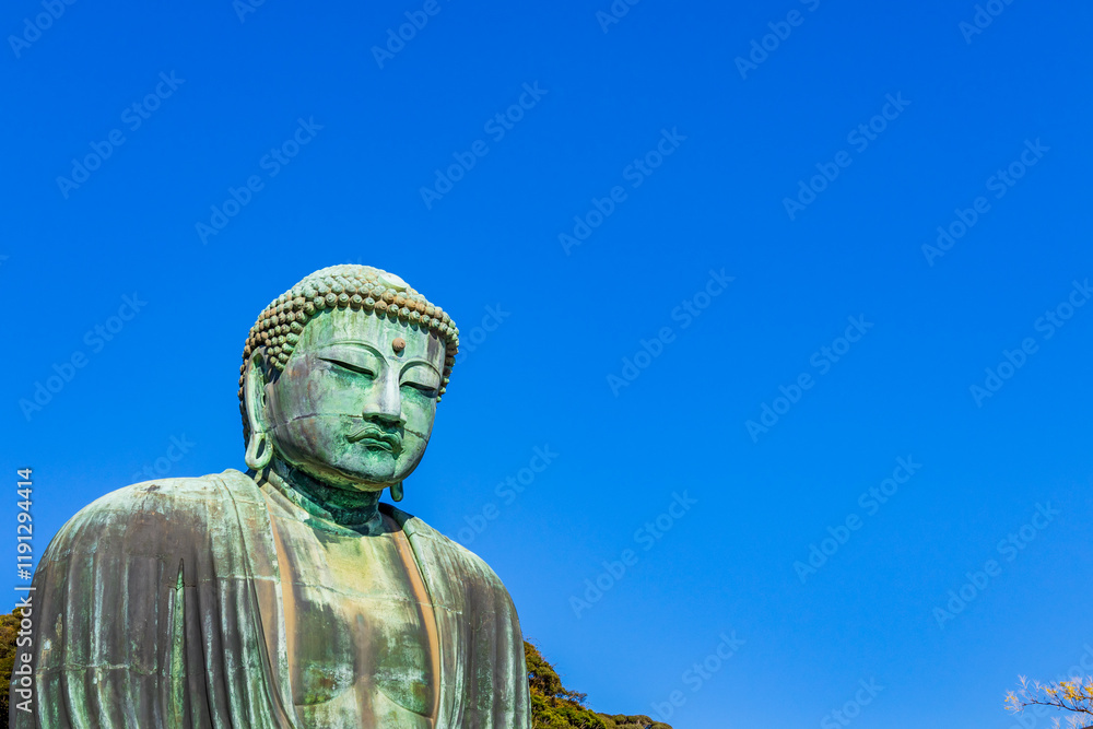 Ancient bronze statue of the Great Buddha Daibutsu at Kotoku-in temple in Kamakura, Japan. It is an important landmark and a popular destination for tourists. Ancient bronze statue of the Great Buddha Daibutsu at Kotoku-in temple in Kamakura, Japan. It is an important landmark and a popular destination for tourists.