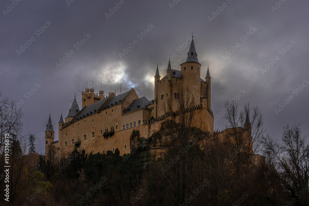 Dramatic Alcázar of Segovia: A Fairytale Castle Perched on a Rocky Hillside. Dramatic Alcázar of Segovia: A Fairytale Castle Perched on a Rocky Hillside.