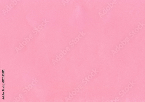 Pink surface of an old paper or cardboard, background, texture. Backdrop of pink paper surface with elements of aging. Old and shabby paper piece. Rose ancient wall. Unsmooth and shabby paper surface