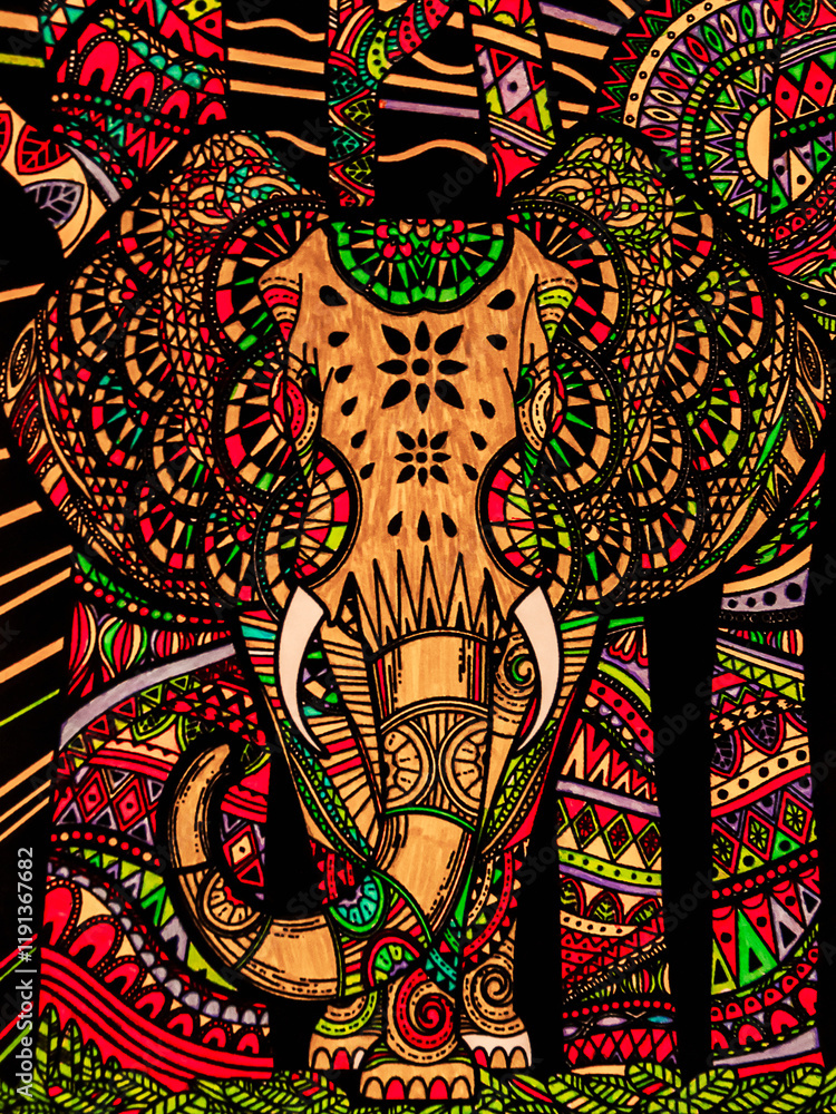 Fototapeta premium graphic representation of a colorful elephant on an Indian fabric cloth