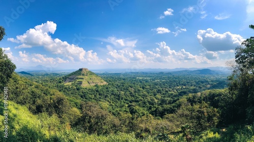 Panoramic View of Lush Green Valley and Ancient Ruins photo