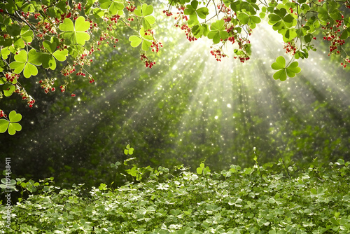 Sunbeams illuminate lush clover field, red berries hang overhead, creating enchanting forest scene; ideal for nature, fantasy, or spring themes photo