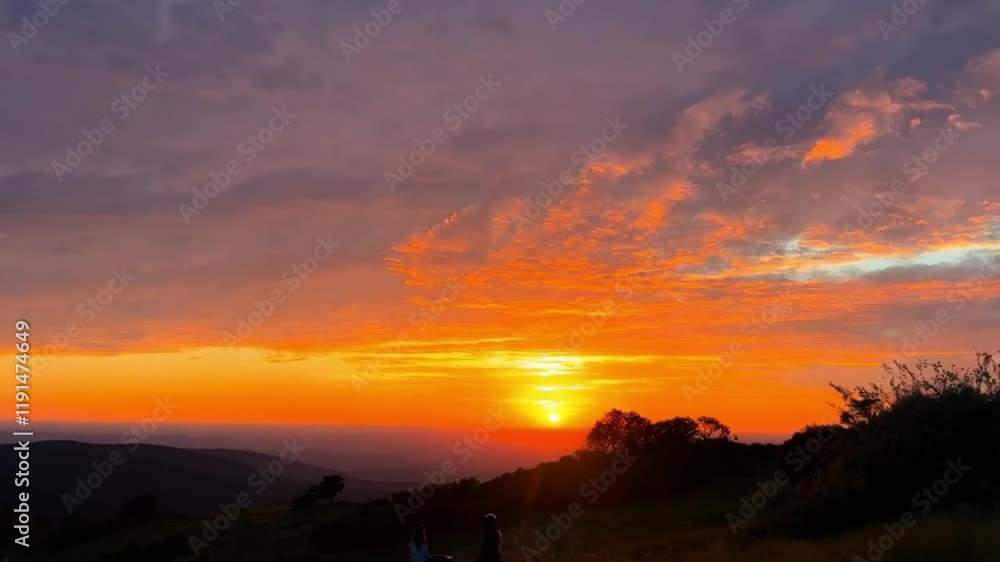 A breathtaking sunset with warm hues of orange, pink, and purple, casting a golden glow over the landscape. A breathtaking sunset with warm hues of orange, pink, and purple, casting a golden glow over the landscape.
