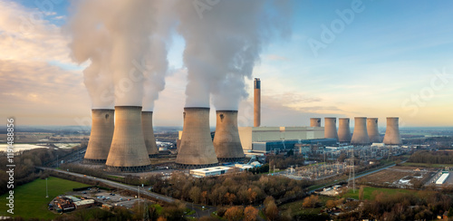 Aerial landscape panorama of large coal fired Power Station in UK countryside at sunset photo