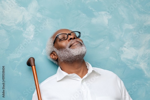 Serene Meditation Elderly Man Embracing Stillness in an Accessible Garden Setting with Space for Text photo