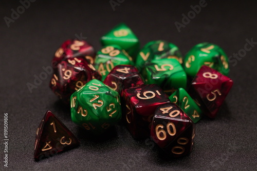 Close-Up Red & Green Dice Rolling on Black
