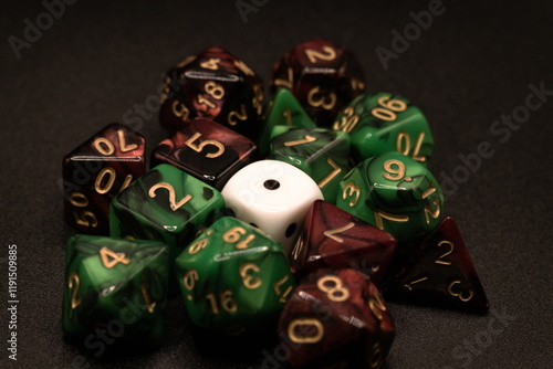Single White Dice Close-Up Isolated on Black with Red & Green