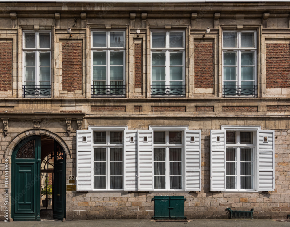 Fototapeta premium Facade of an old building in the historical part of the city