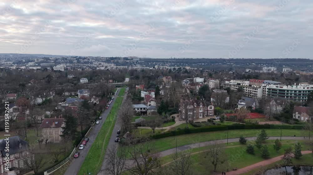 View of urban landscape with park and residential areas in France View of urban landscape with park and residential areas in France