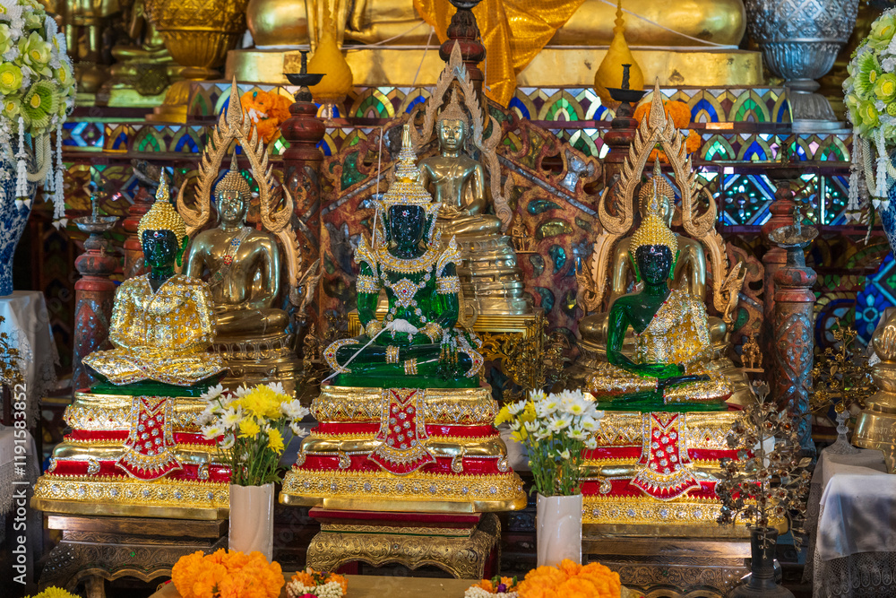 Fototapeta premium Emerald Buddhas at Wat Phra Singh in Thailand