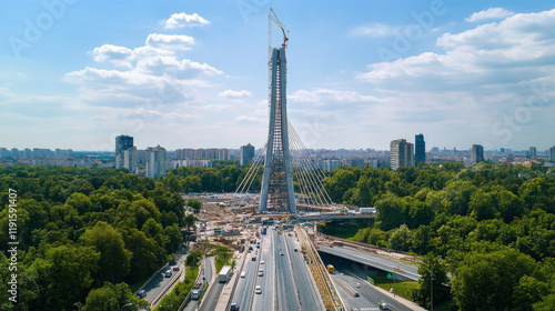 Warsaw, Poland - July 1, 2024: View of the Warsaw Spire and Ghelamco The Bridge under construction photo