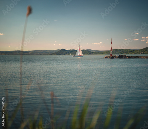 Obraz na płótnie View on lake Balaton in spring with bench w salonie