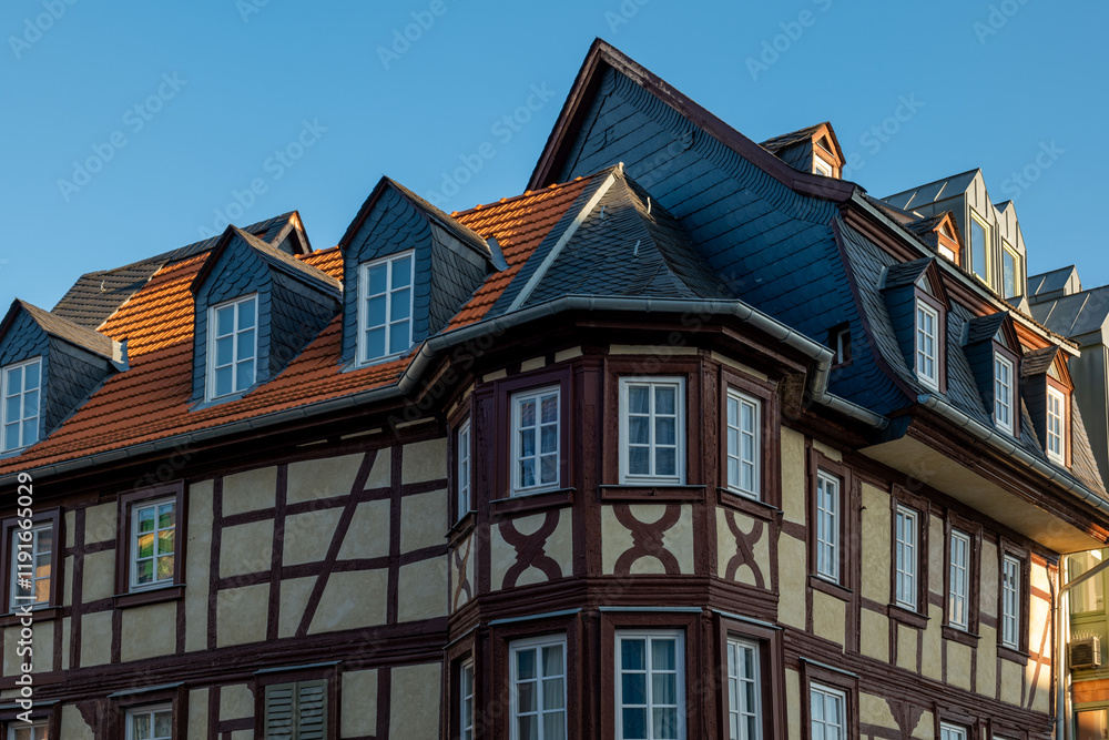 Fototapeta premium Elegant architecture of a historic building showcasing traditional European design in a clear blue sky