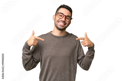 Young handsome caucasian man over isolated background proud and self-satisfied photo