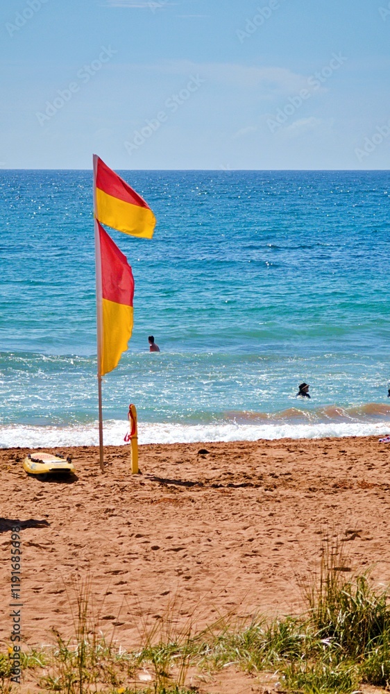 Malua Bay on South Coast NSW Australia. Yellow colour sandy beach. Lifeguards. Seating. Rescue. Views to the ocean. Malua Bay on South Coast NSW Australia. Yellow colour sandy beach. Lifeguards. Seating. Rescue. Views to the ocean.