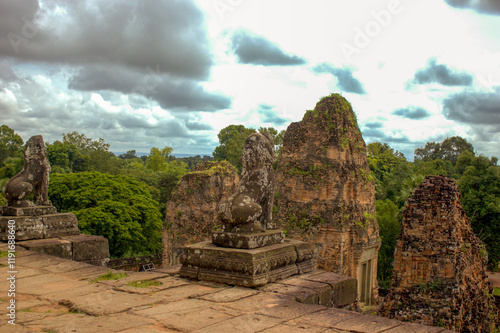 Ancient lion statue on the East Mebon temple in the Angkor Wat complex in Siem Reap, Cambodia photo