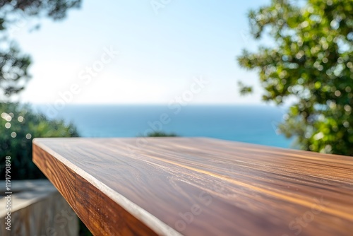 Side Perspective Of Rectangular Brown Wooden Counter With Detailed Grains, Framed By Sparkling Ocean View, Perfect For Modern Decor And Scenic Outdoor Photography Themes photo