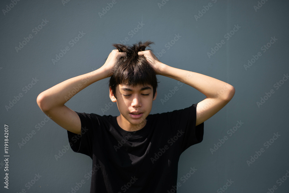Teenage Boy's Expressions Collage: A captivating grid showcases a young Asian boy's diverse facial expressions, capturing a range of emotions from joy to contemplation. Teenage Boy's Expressions Collage: A captivating grid showcases a young Asian boy's diverse facial expressions, capturing a range of emotions from joy to contemplation.