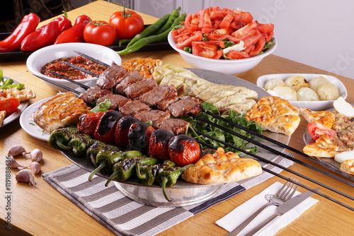 A vibrant gourmet dish of grilled meat and vegetables, perfect for a healthy dinner party, Turkish sish kebab