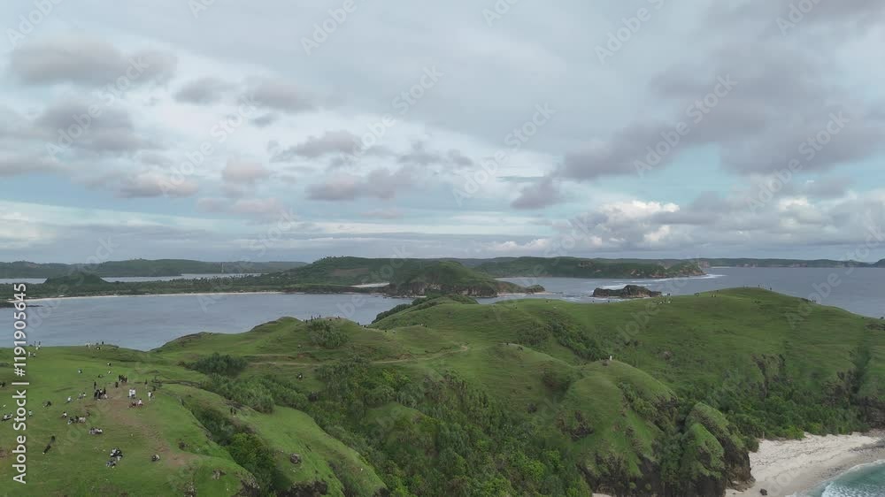 Aerial View of Coastline with Green Hills and Crashing Waves - Merese Hill, Lombok Aerial View of Coastline with Green Hills and Crashing Waves - Merese Hill, Lombok