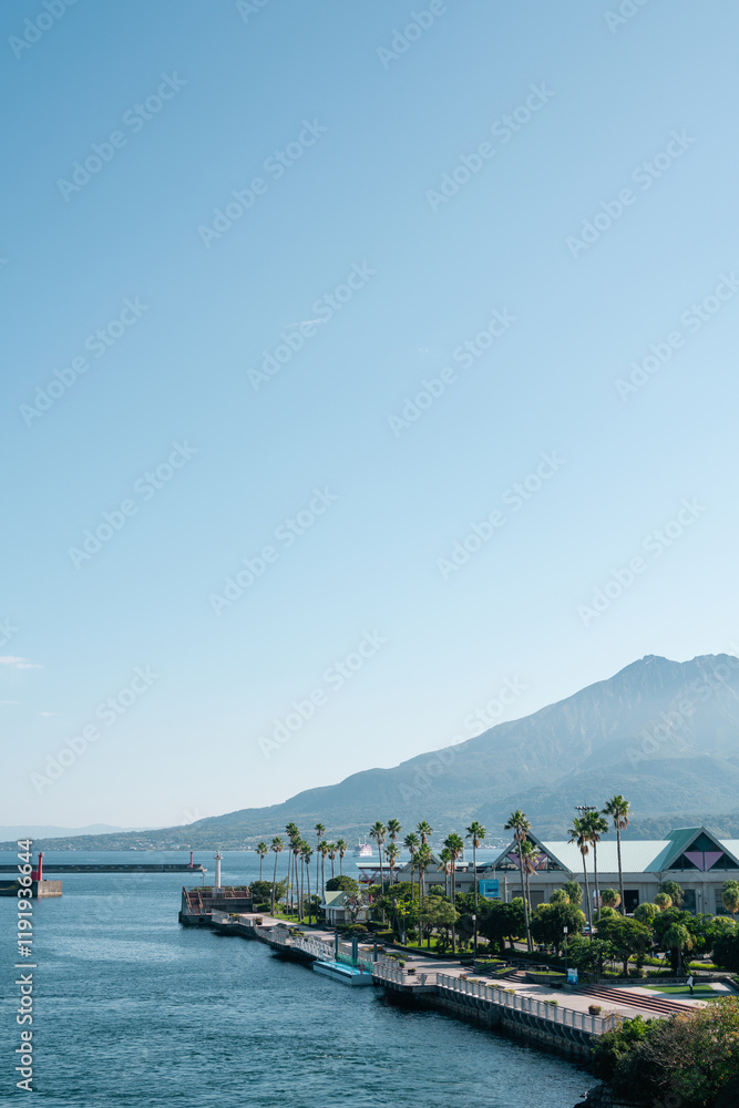 View of Kagoshima harbor and Sakurajima volcano island in Kagoshima, Japan