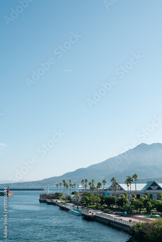 Obraz na płótnie View of Kagoshima harbor and Sakurajima volcano island in Kagoshima, Japan w salonie