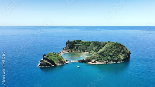 Aerial view over scenic Vila Franca islet capturing pristine volcanic lagoon photo