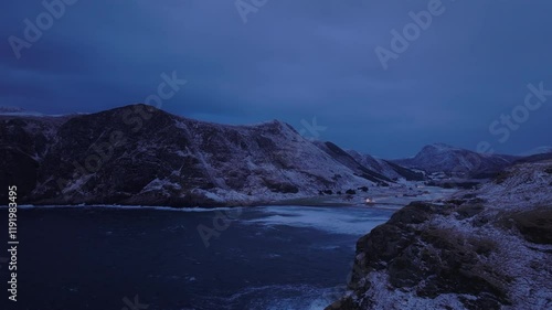 Aerial reveal of the famous beach and surfing spot in Ervik, Norway photo