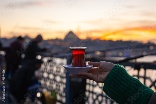 Turkish Tea (Türk Çayı) Photo in Front of Istanbul Symbol Suleymaniye Mosque, Galata Bridge Beyoglu, Istanbul Turkiye (Turkey) photo