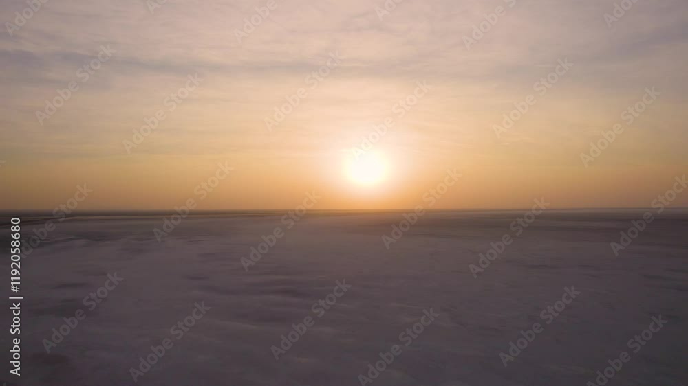 4K Aerial view of White rann of Kutch during sunset or sunrise. Nature landscape. Expansive salt marsh of The Great Rann of Kutch in Gujarat, India. Nature landscape. 4K Aerial view of White rann of Kutch during sunset or sunrise. Nature landscape. Expansive salt marsh of The Great Rann of Kutch in Gujarat, India. Nature landscape.