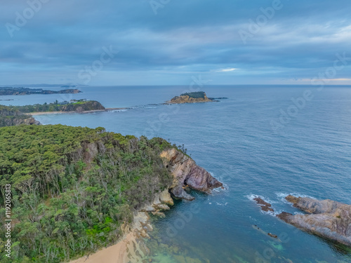 Cloud-covered sunrise over Guerilla Bay photo